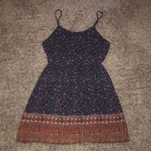 Blue flowery girls sun dress with open back